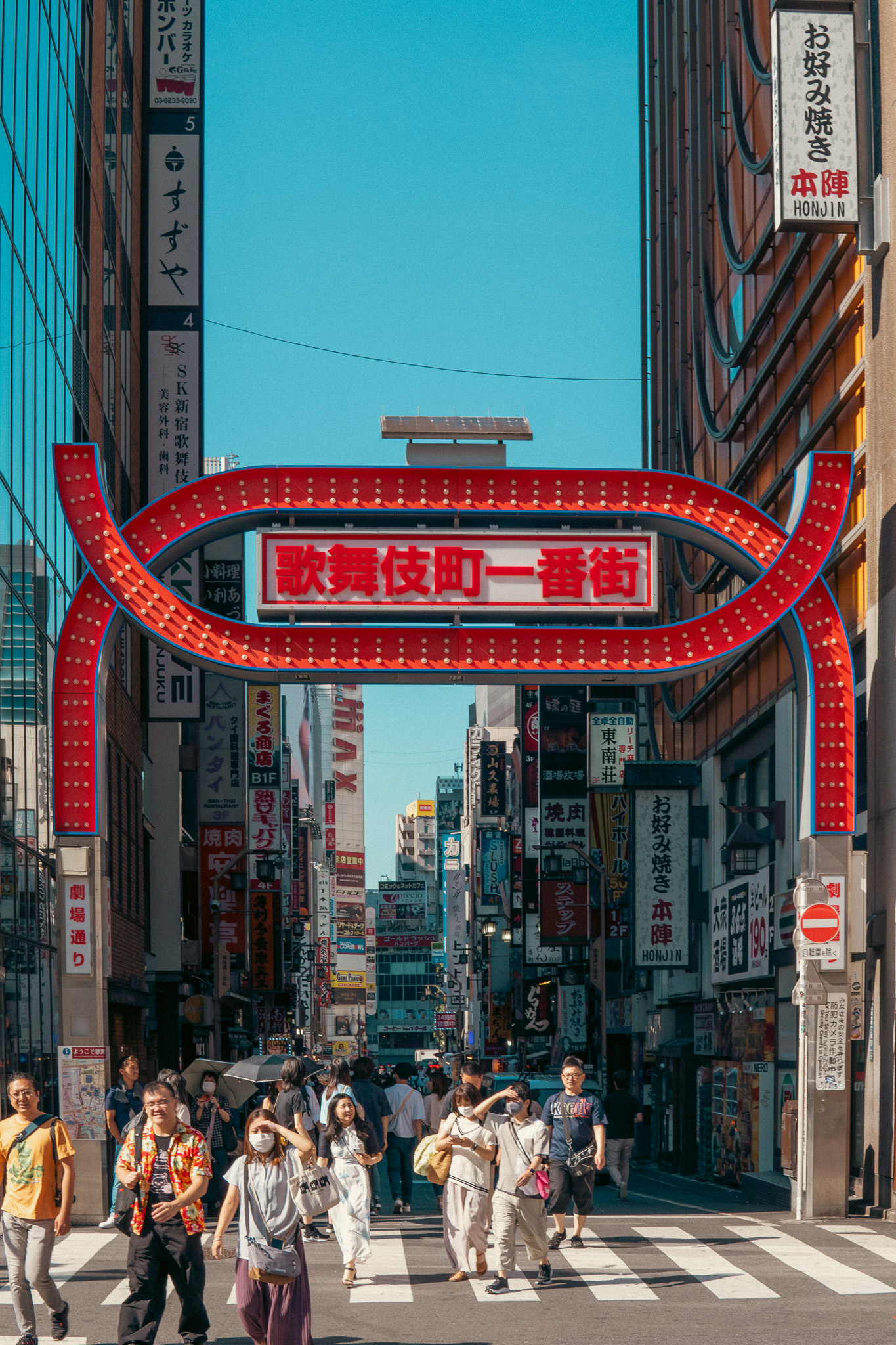 Street crossing under red sign